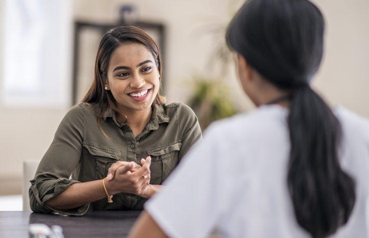 Two women chatting